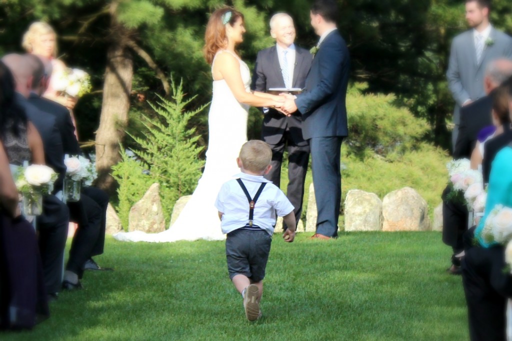 ring bearer running during ceremony new england wedding